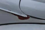 vw bug show photos red oxide near side gutter.JPG (90624 bytes)