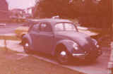 vw standard model oval beetle  driveway 1970s.jpg (106658 bytes)
