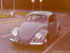 vw standard model oval beetle  on the road.jpg (165090 bytes)